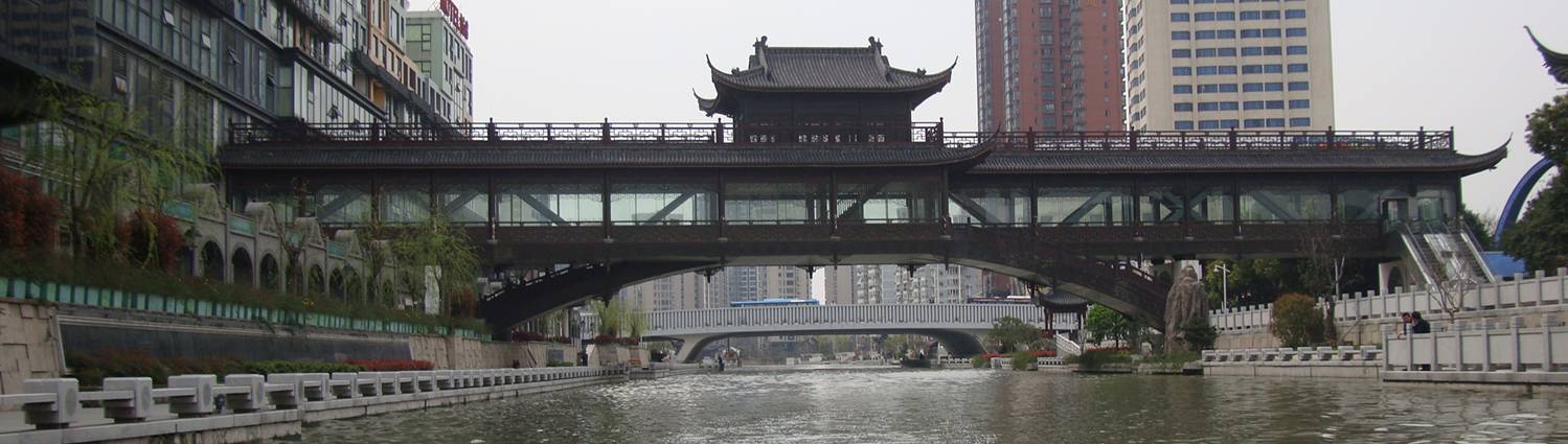 Enclosed footbridge across the canal, Wuxi, China