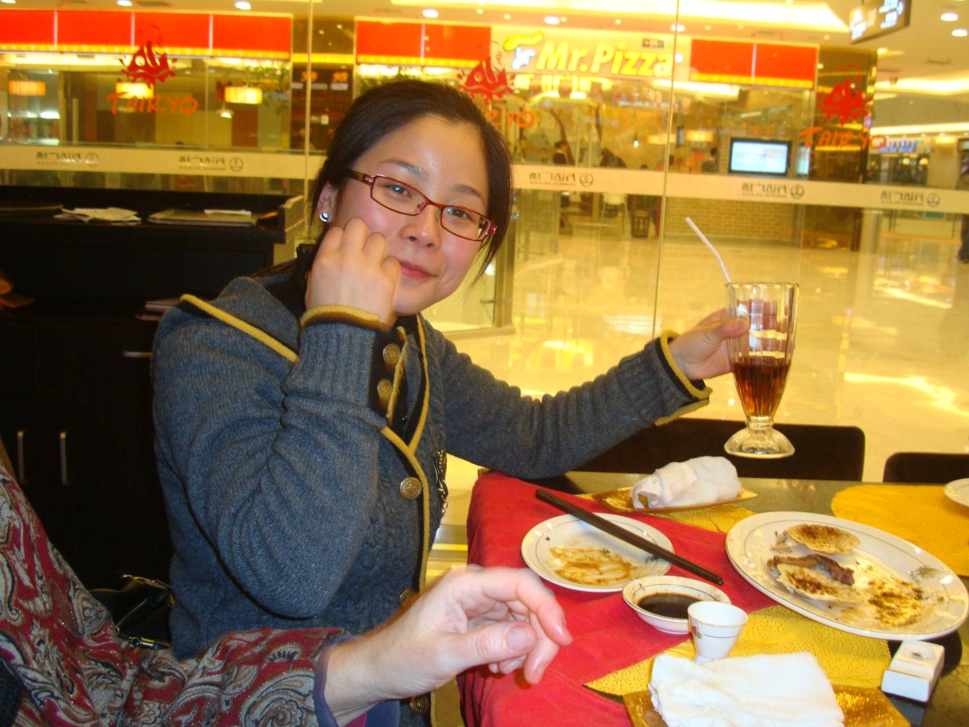 Picture:  Our Chinese teacher, Carolyn, having a conversion experience.  She found out she likes Japanese food.  Wuxi, China