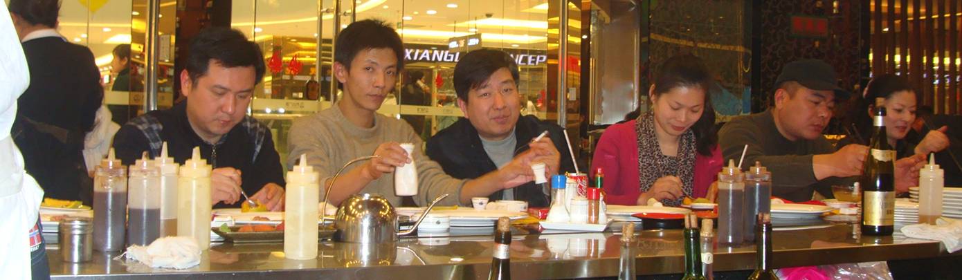 Picture:  it might look like a greasy spoon counter, but it's a high end Japanese restaurant with great food, and smokers.  Wuxi, China