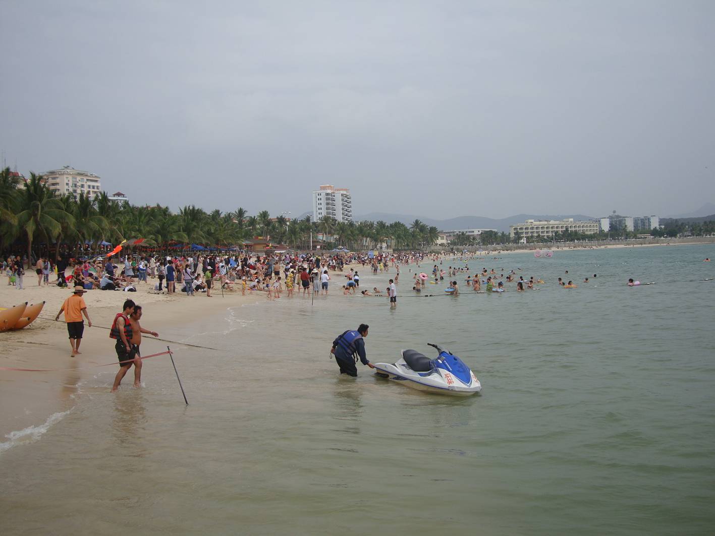 Picture:  The beach at Da Dong Hai, Hainan Island, China.  Fun and games.