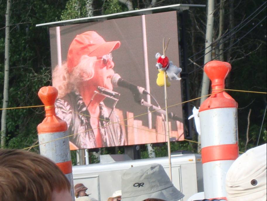 Arlo Guthrie on the big screen while performing live at the Winnipeg Folk Festival 2009