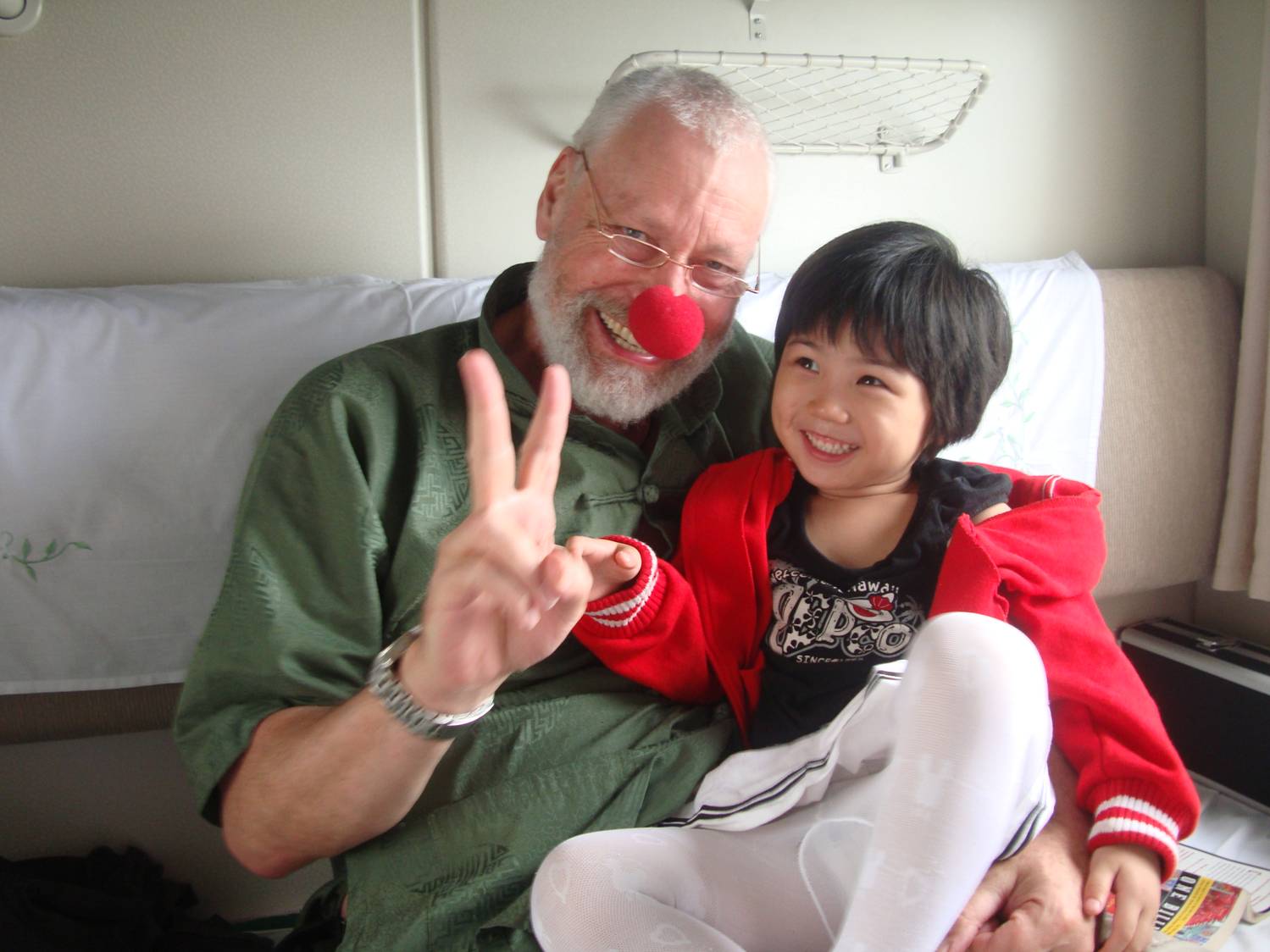 Always better to have a clown nose and not need one, than to need a clown nose and not have one. In the soft sleeper compartment from Guangzhou to Wuxi,  China.