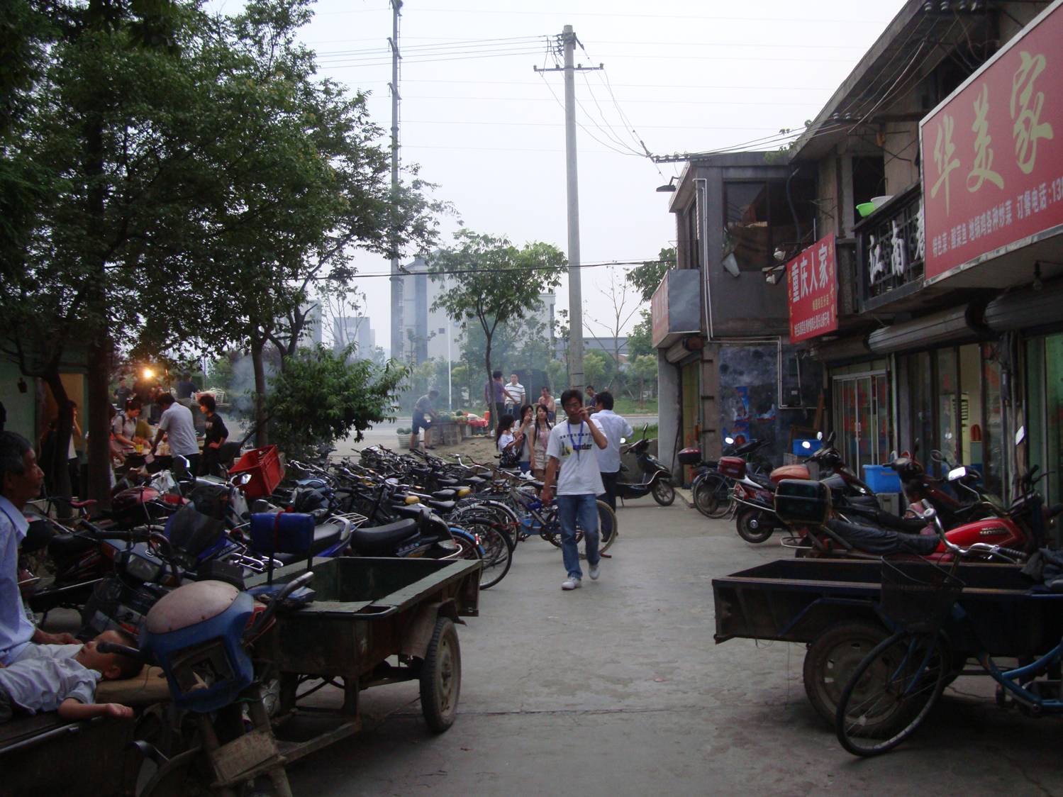 This is the start of the restaurant strip near the East gate,  Jiangnan University,  Wuxi,  China