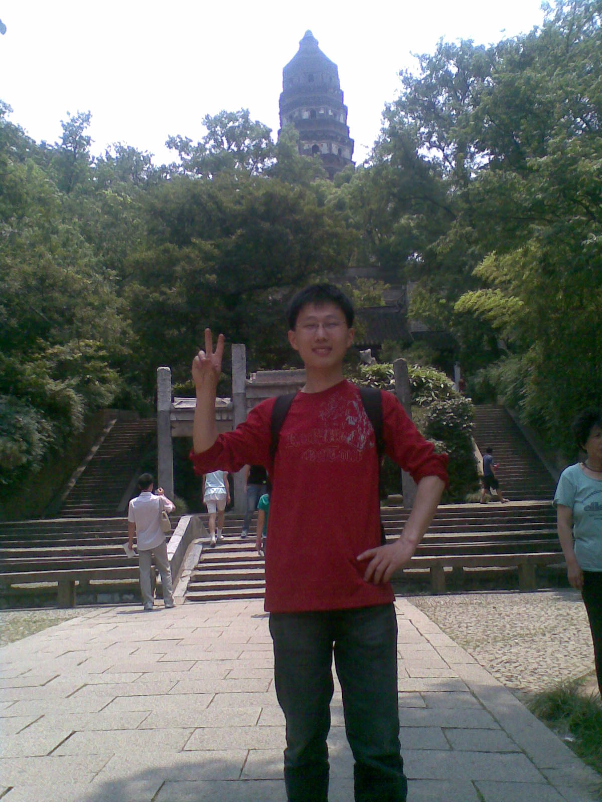 William on bicycle tour in Suzhou,  China   Tiger Hill  (虎丘) Pagoda in the background.