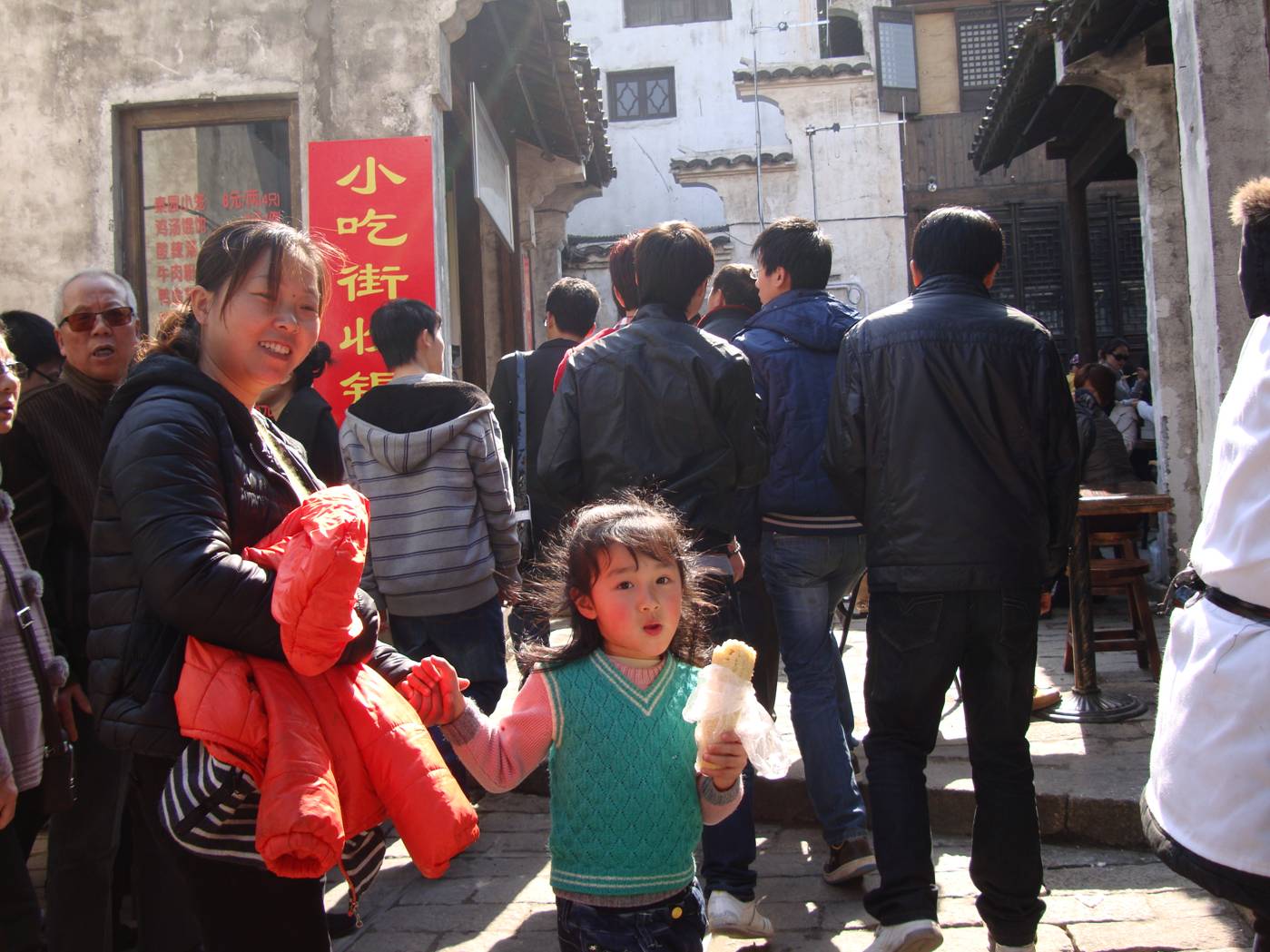 Picture:  For some kids, a foreigner is still something to comment on.  Wuxi ancient city, Wuxi, China