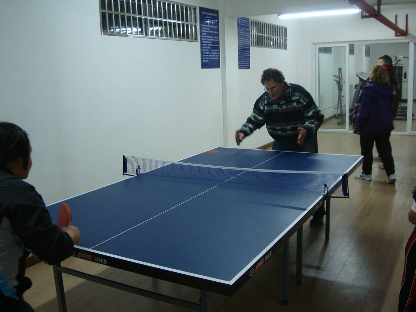 Ping pong in the new fitness room at the foreign teachers' apartments.  Jiangnan University, Wuxi, China