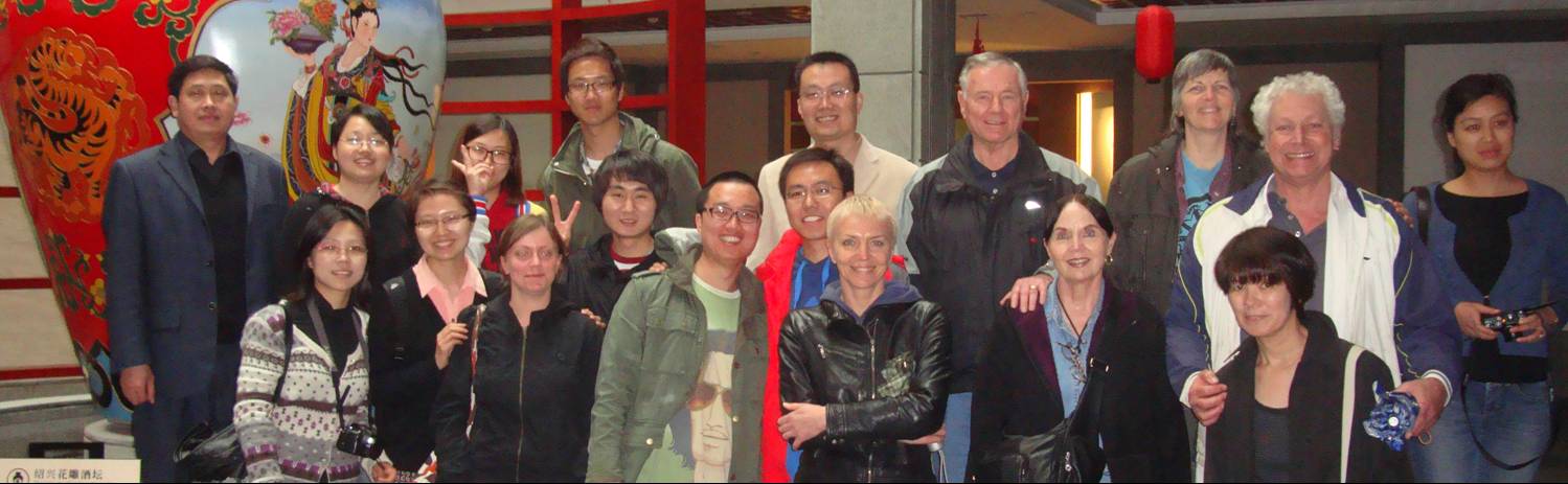 Picture: A group picture taken at the Shaoxing yellow wine museum.  The tour included a tasting room.  Shaoxing, China