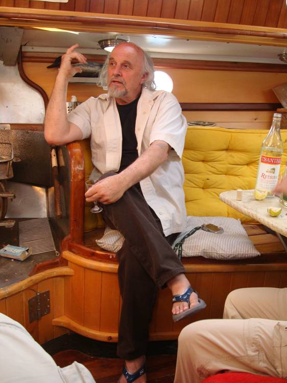 Godfrey Stephens,  artist, at home on his boat, surrounded by his own art and craftsmanship.  Victoria, B.C., Canada