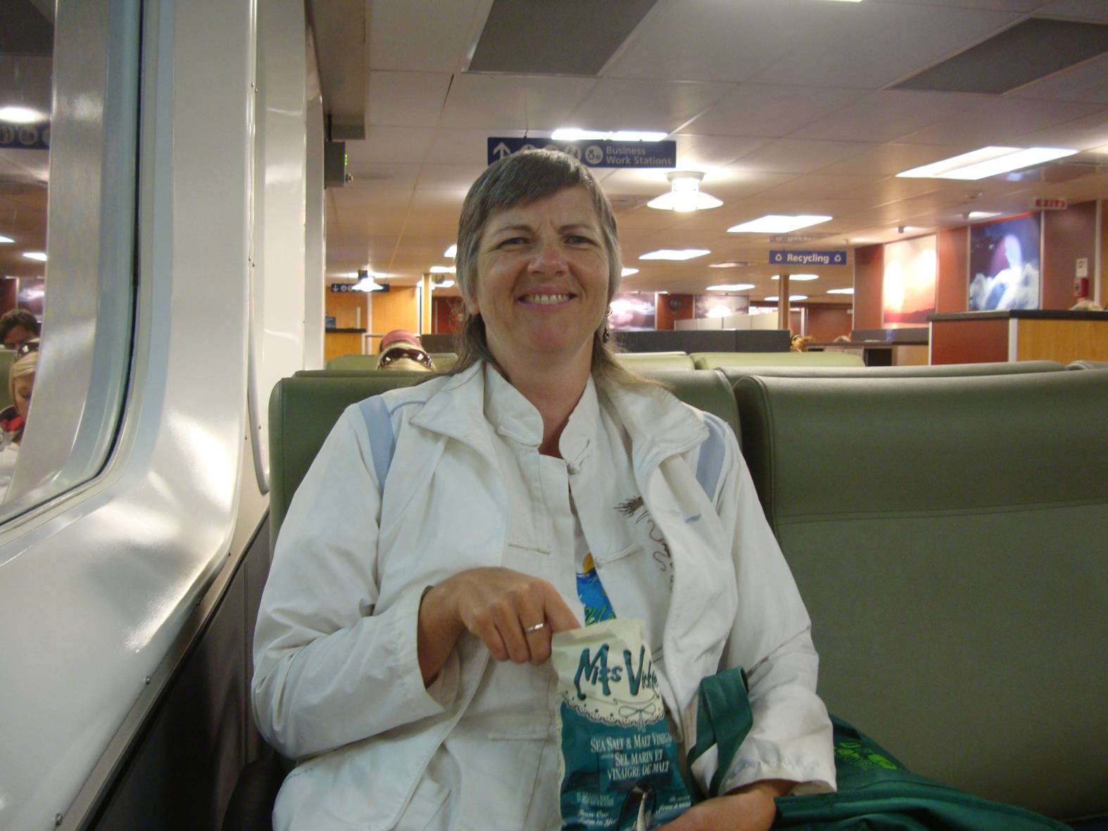 picture:  Ruth enjoys a bag of Miss Vickie's Salt and Vinegar potato chips on the ferry back to Horseshoe Bay, B.C.