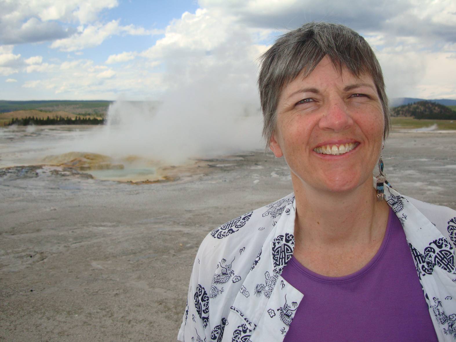 picture:  Ruth with a hot pool behind her.  Yellowstone Park