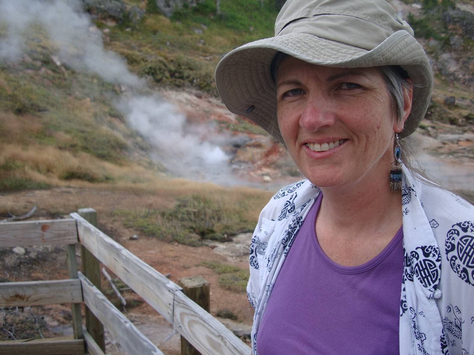 picture:  Ruth with a hot pool behind her.  Yellowstone Park