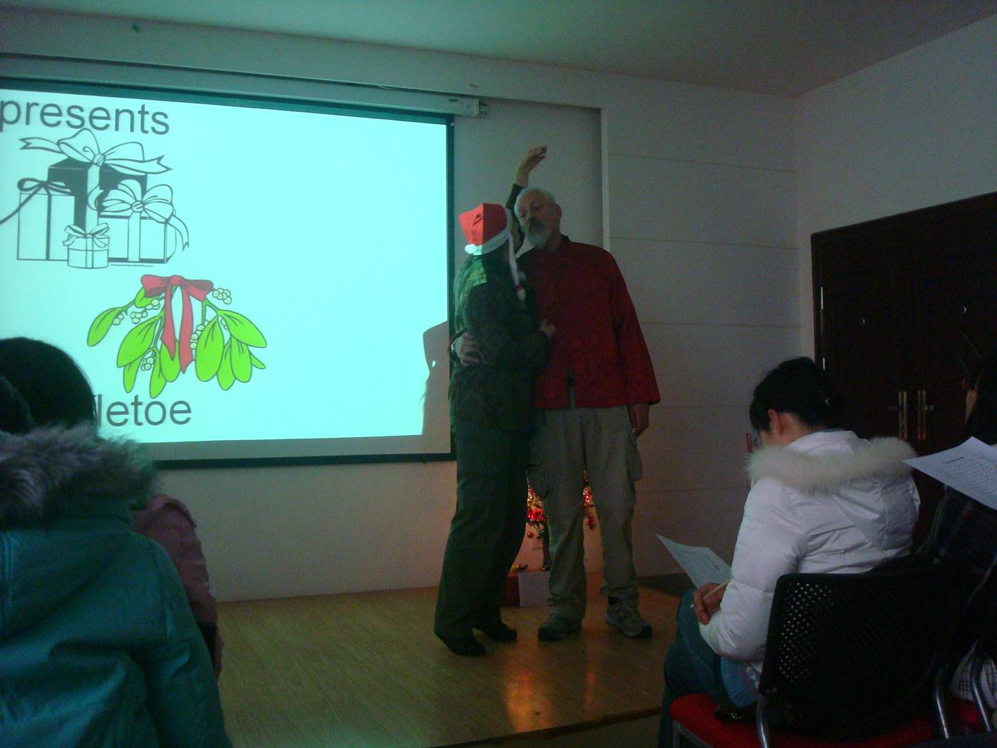 Demonstrating the power of mistletoe.  The Christmas culture party on Christmas morning.  Jiangnan University, Wuxi, China