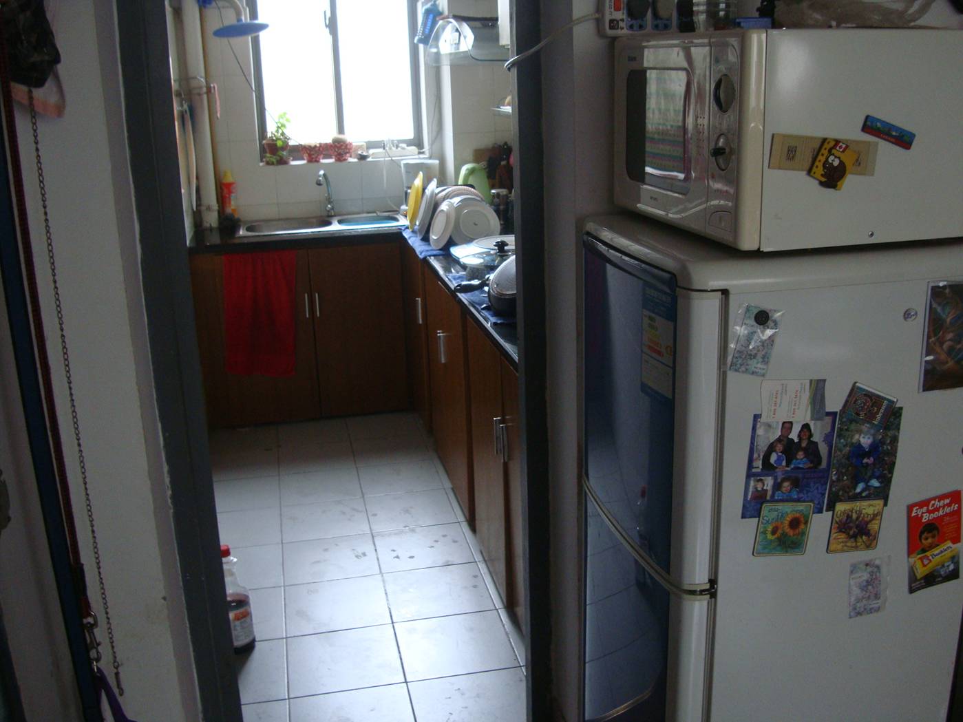 Picture:  There's no room in our kitchen for the fridge and microwave.  Apparently feng shui rules say that a fridge should not be near a stove anyway.  Jiangnan University, Wuxi, China (I don't belive in feng shui.)