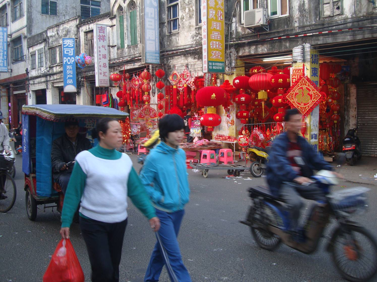 Picture:  Colourful shops sprang up all over Haikou, selling decorations for the Chinese New Year festivities.  Hainan Island, China