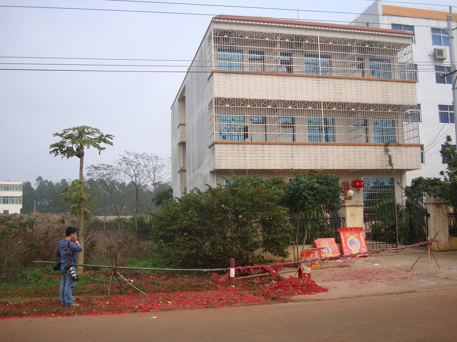 Picture:  Xiao Hua's mother and father's new home in Yan Feng village near Haikou on Hainan Island, China