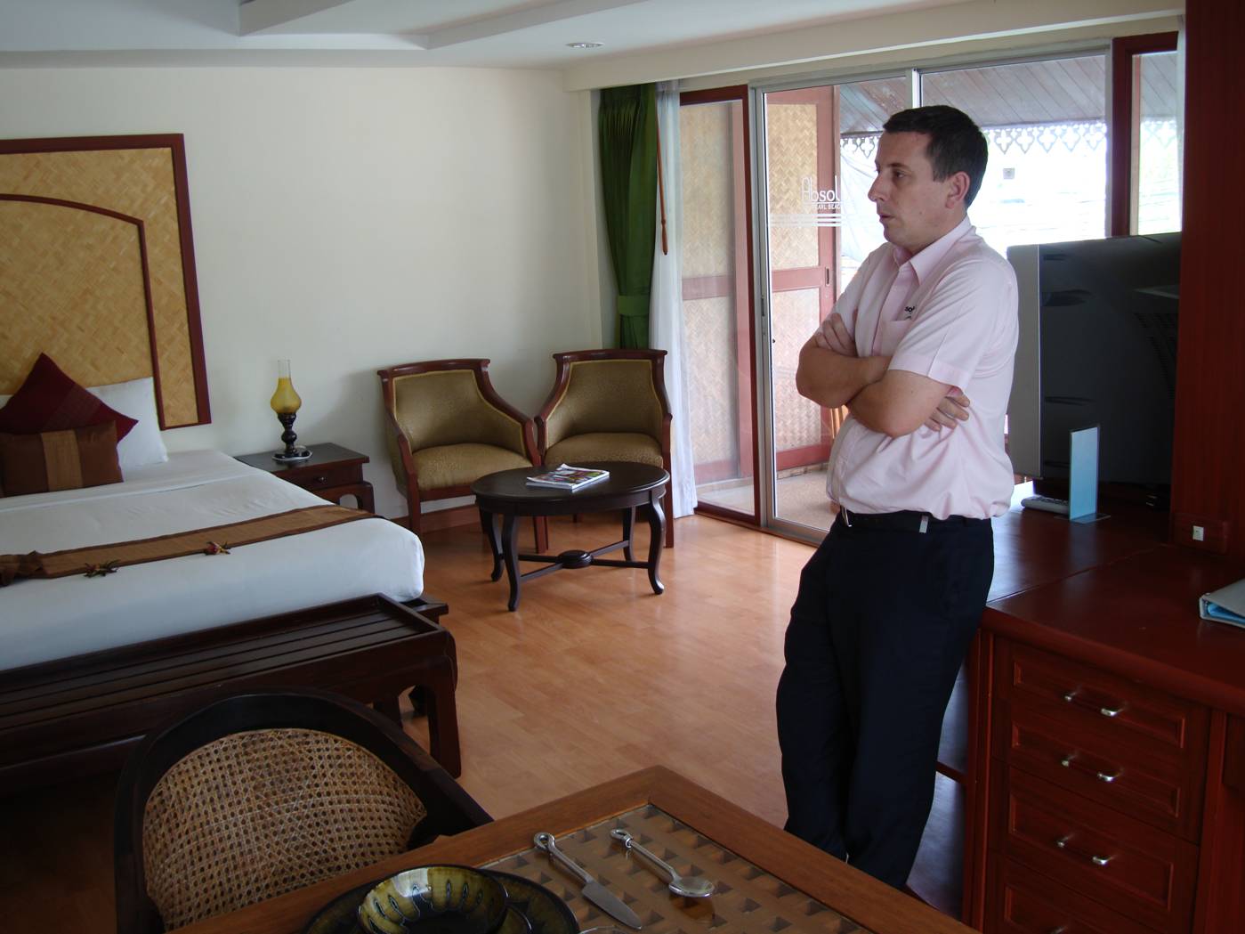 Picture:  Adam shows us the kinds of room you can have for a song if you join the club.  Phuket Island, Thailand