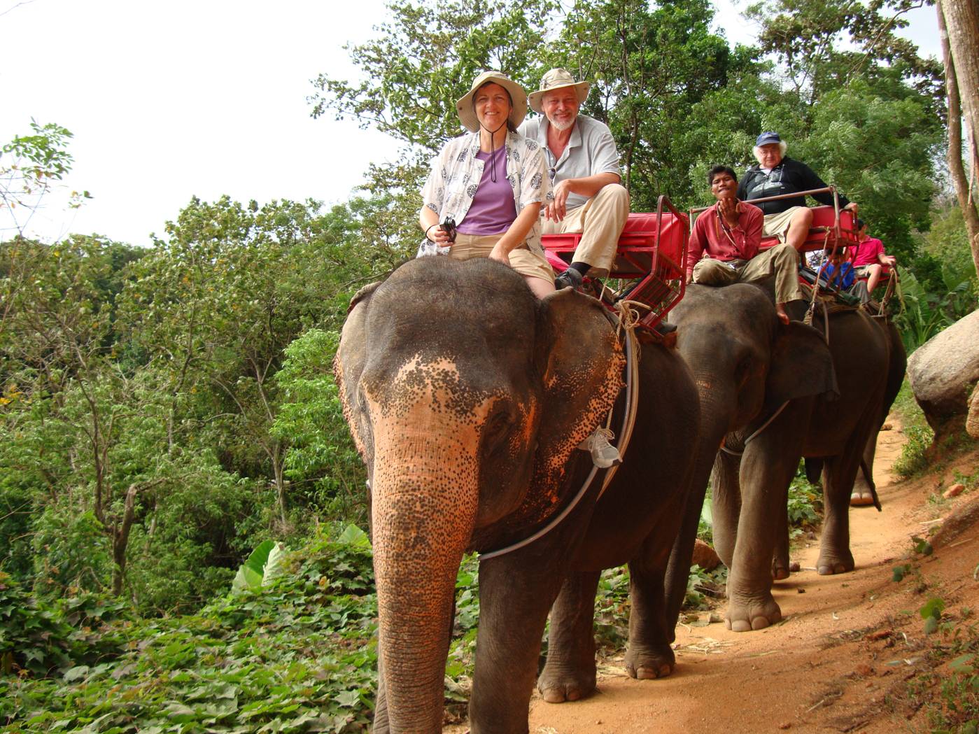 Picture:  Ruth at the wheel of several tons of elephant.  David is just a passenger.  Phuket Island, Thailand