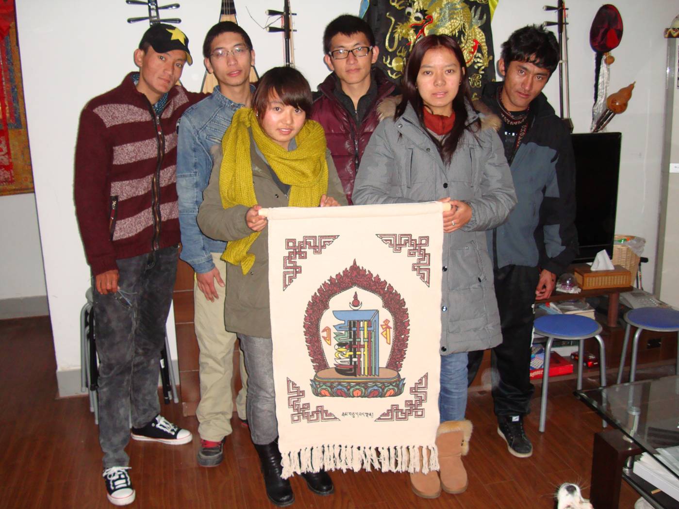 Picture:  Our Tibetan students presented us with a wall hanging.  Jiangnan University, Wuxi, China