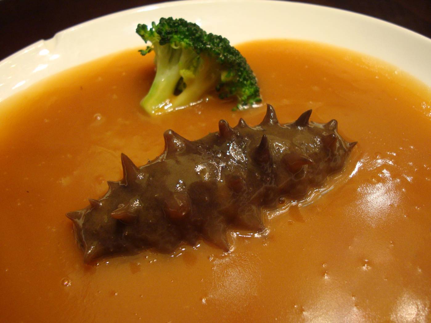 The sea cucumber is more or less tasteless, like hardened gelatin,  but the broth was delicious.