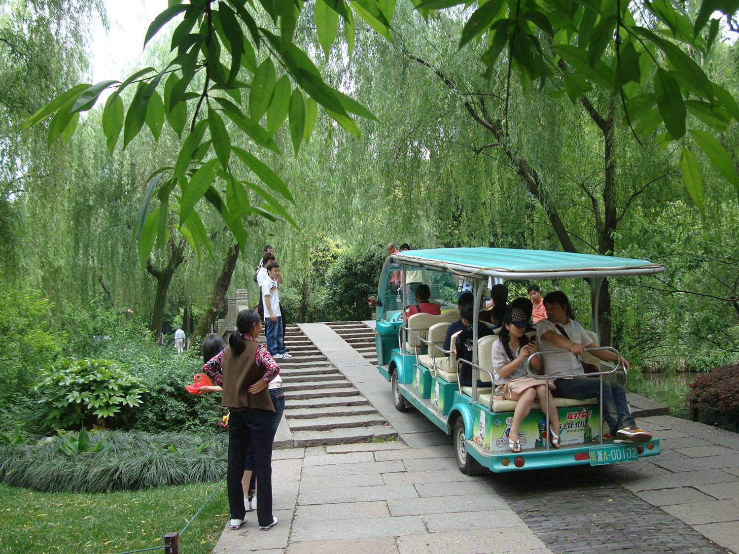 It was a thrill going over the little bridges.  West Lake Park,  Hangzhou,  Zhejiang,  China