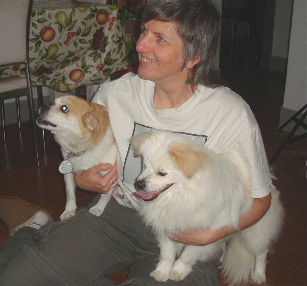 Picture:  Ruth with GouGou and HuaHua.  Long fur looks great when clean.  Jiangnan University, Wuxi, China