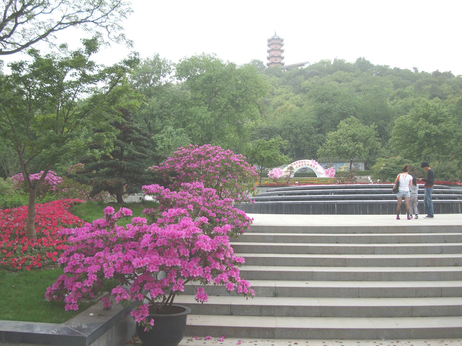 Picture:  Near the entrance to Xi Hui Park in Wuxi, China.  It was a surprse to find the park so empty on such a beautiful Spring day.  Wuxi, China