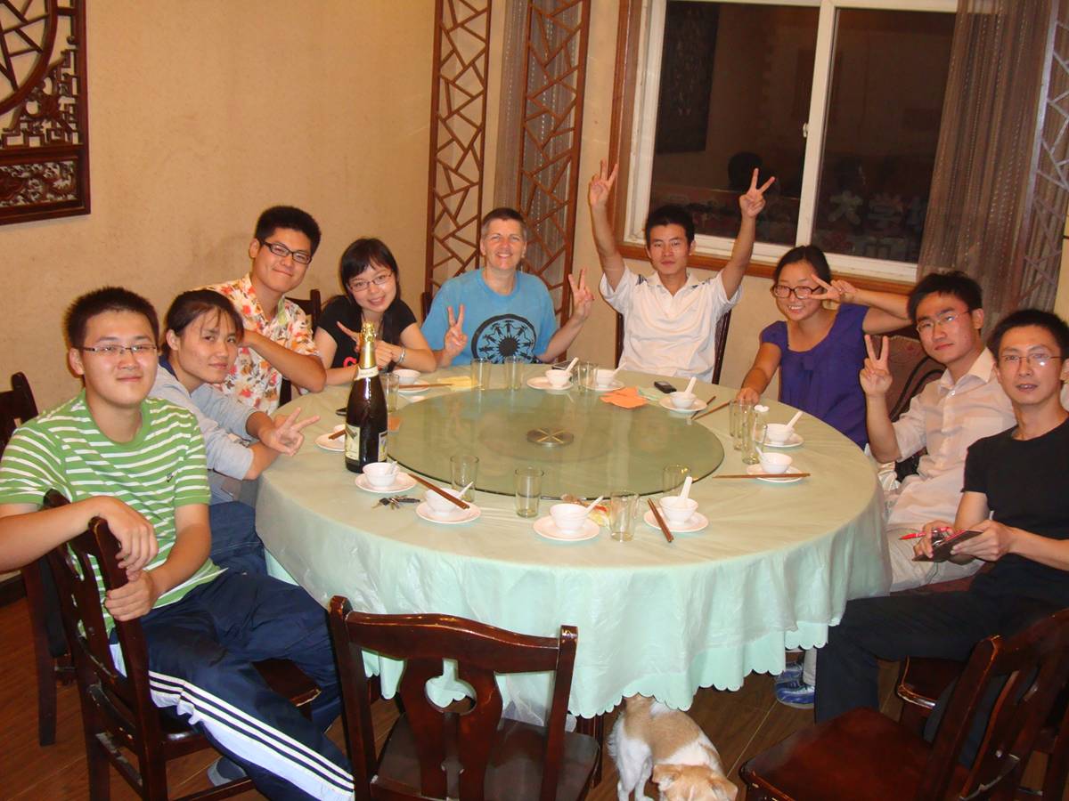 Ruth's birthday feast.  That's our dog under the table.  Restaurants here are much more relaxed about that kind of thing.  Shi Tang Jie, Wuxi, China