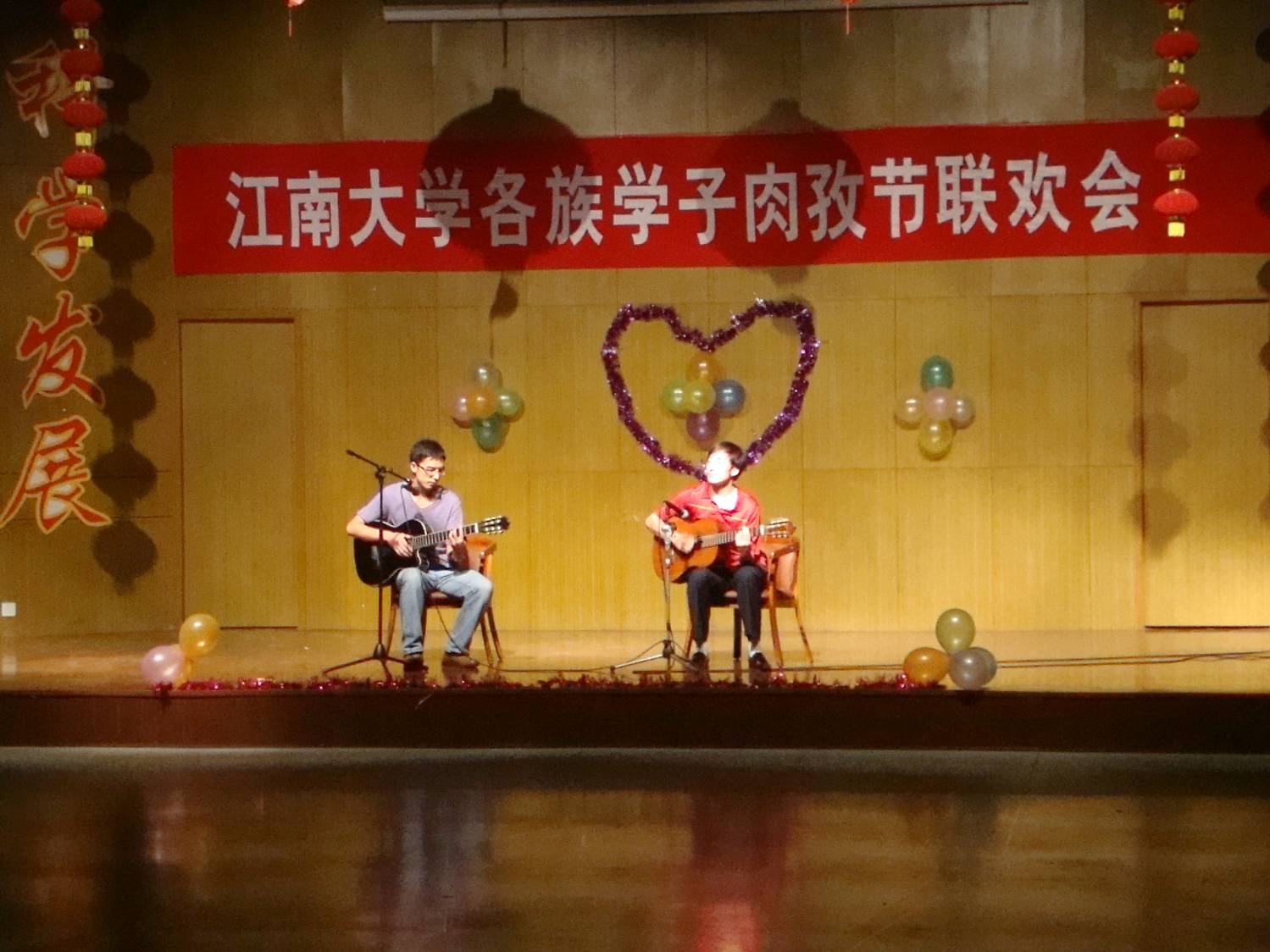 Fancy guitar work and great singing by a pair of Uighur students.  Jiangnan University, Wuxi, China