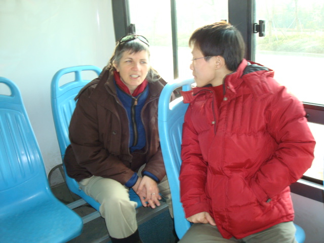 Ruth and William having a Chinese lesson  on the bus to downtown Wuxi.