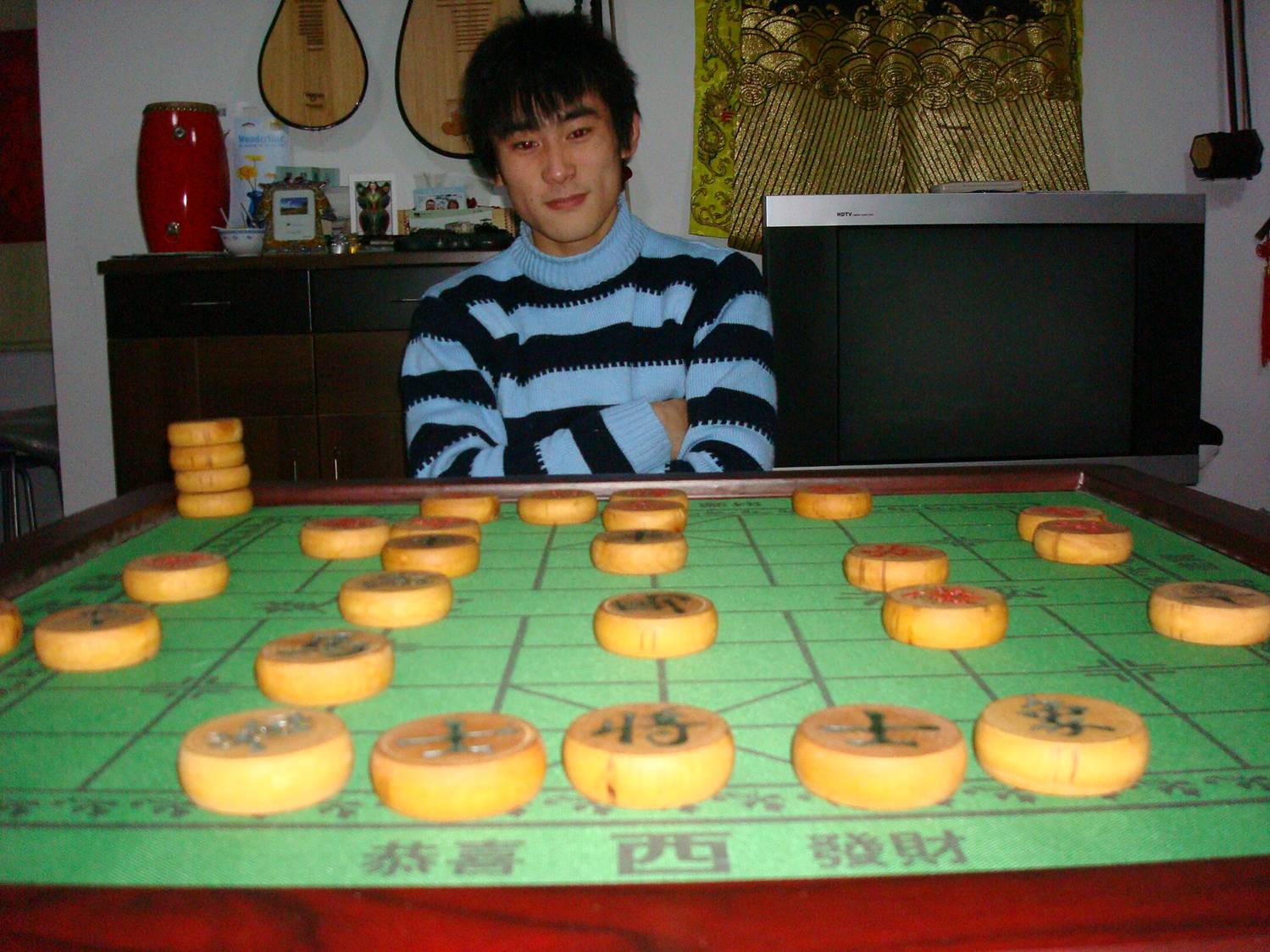 Wang Rulong at the Chinese Chess table.